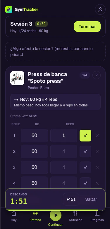 GymTracker móvil en modo oscuro: sesión en curso y temporizador de descanso.